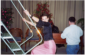 On rollover, text on the image says 'Arianna Vazquez, CubbyVision director and producer, on the studio set of CubbyVision'.