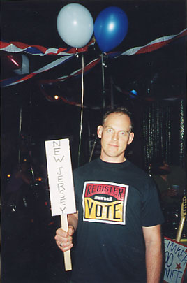 Cubby Karl representing his home state New Jersey with a sign