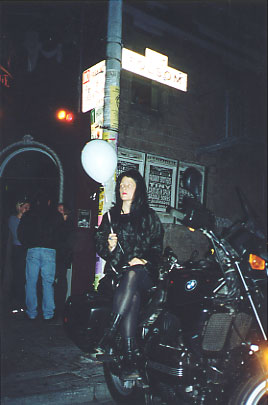 Cubby Vice-Presidential candidate Suzie Potsniff resting on a motorcycle outside the Paradise Lounge
