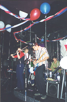 Jol jamming on stage with The Cubby Creatures